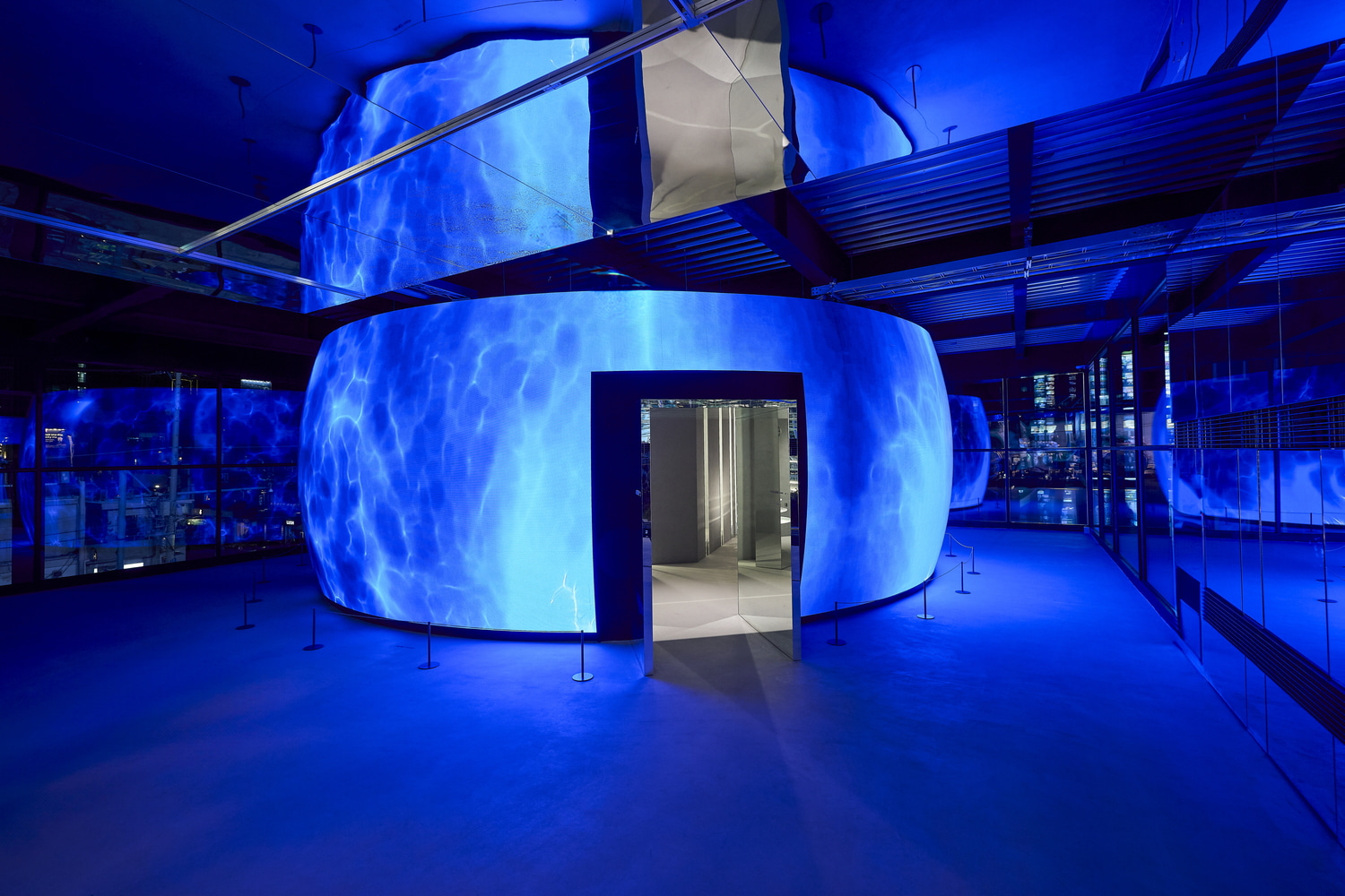 Blue Elephant Space Seongsu LED sphere casting deep blue media art across the second floor, Seoul flagship store