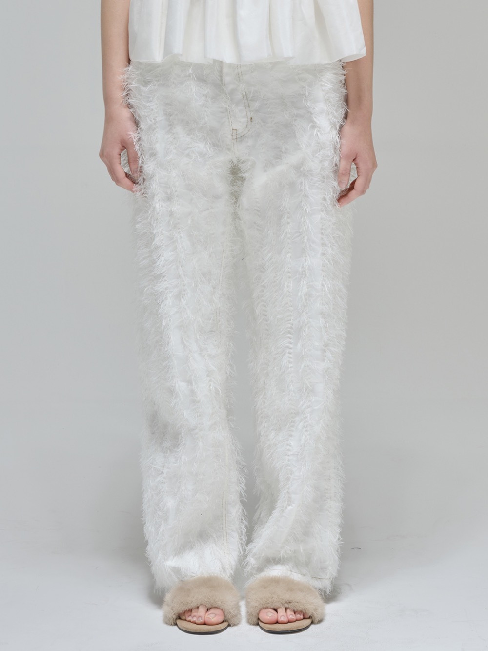Faux feathered straight-leg pants in ivory