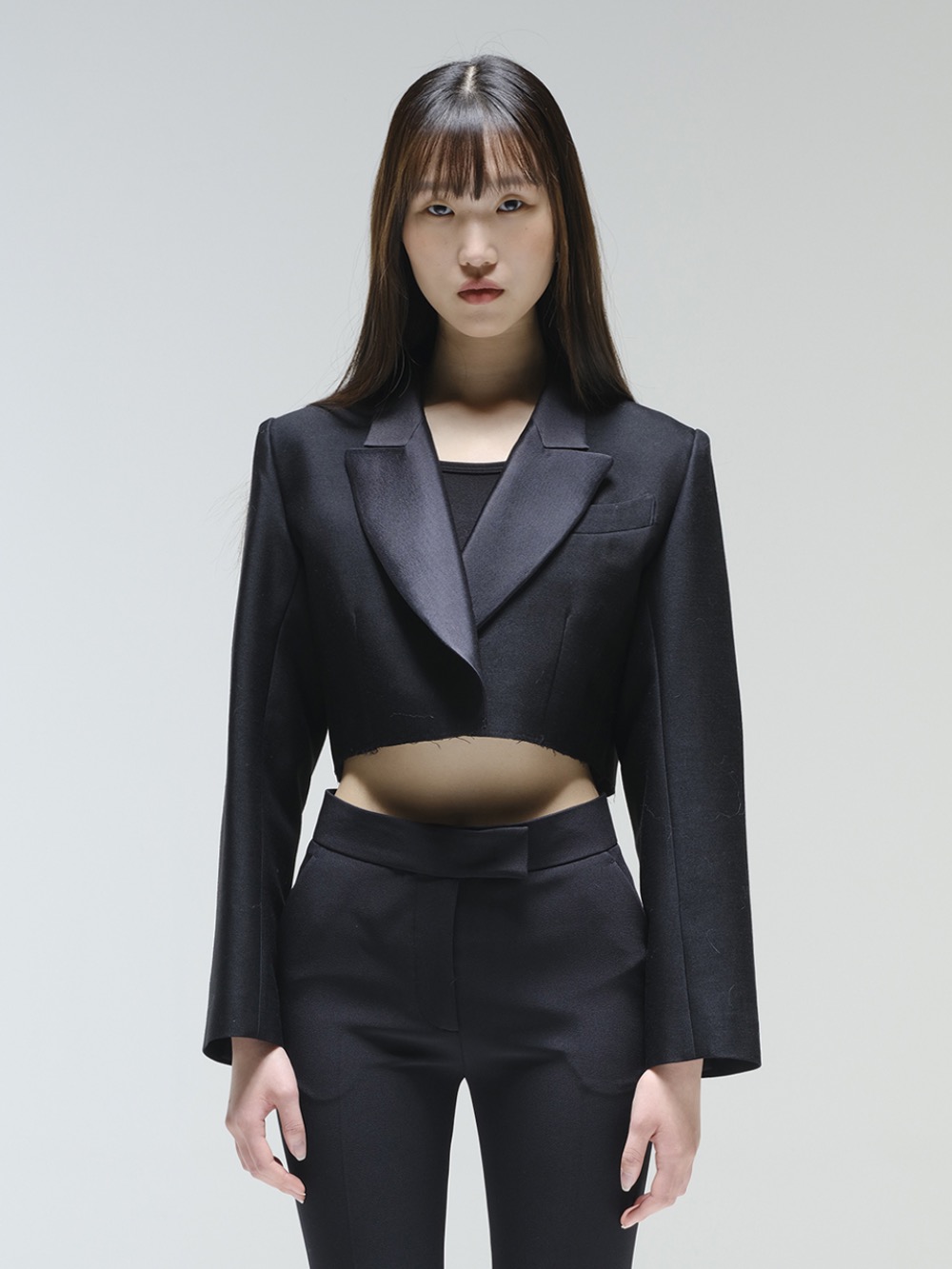 Cropped raw-edge wool-silk jacket in black