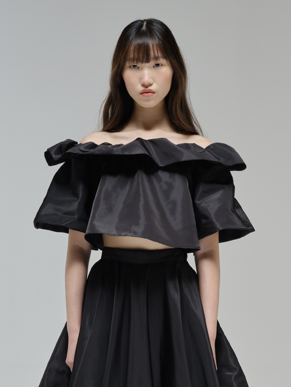 Ruffle cropped top with balloon sleeves in black