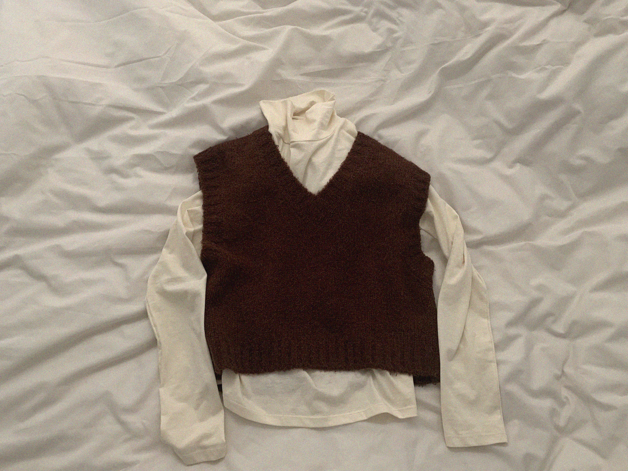 Tail knitwear vest