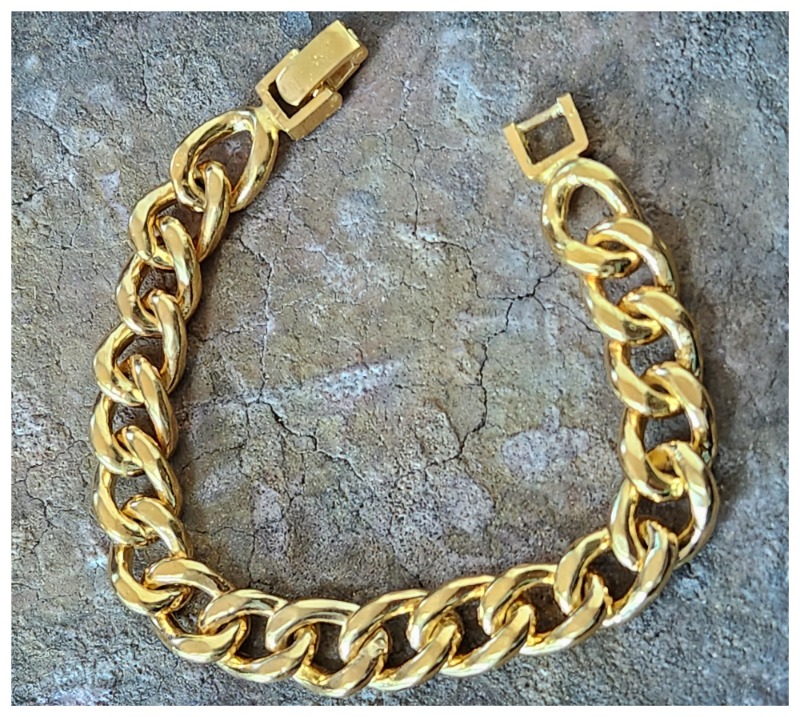 Gold-plated bronze curb chain bracelet with pyramid-shaped suds | UNOAERRE  Italian Jewellery