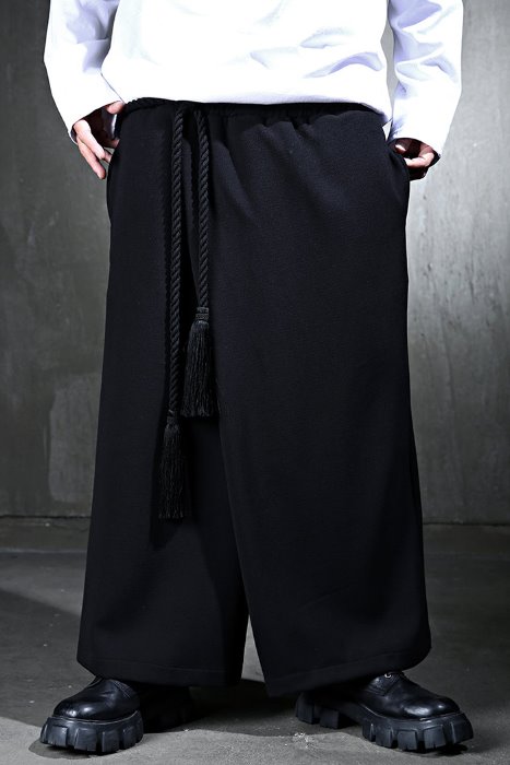 Mukha diagonal wrap skirt wide trousers