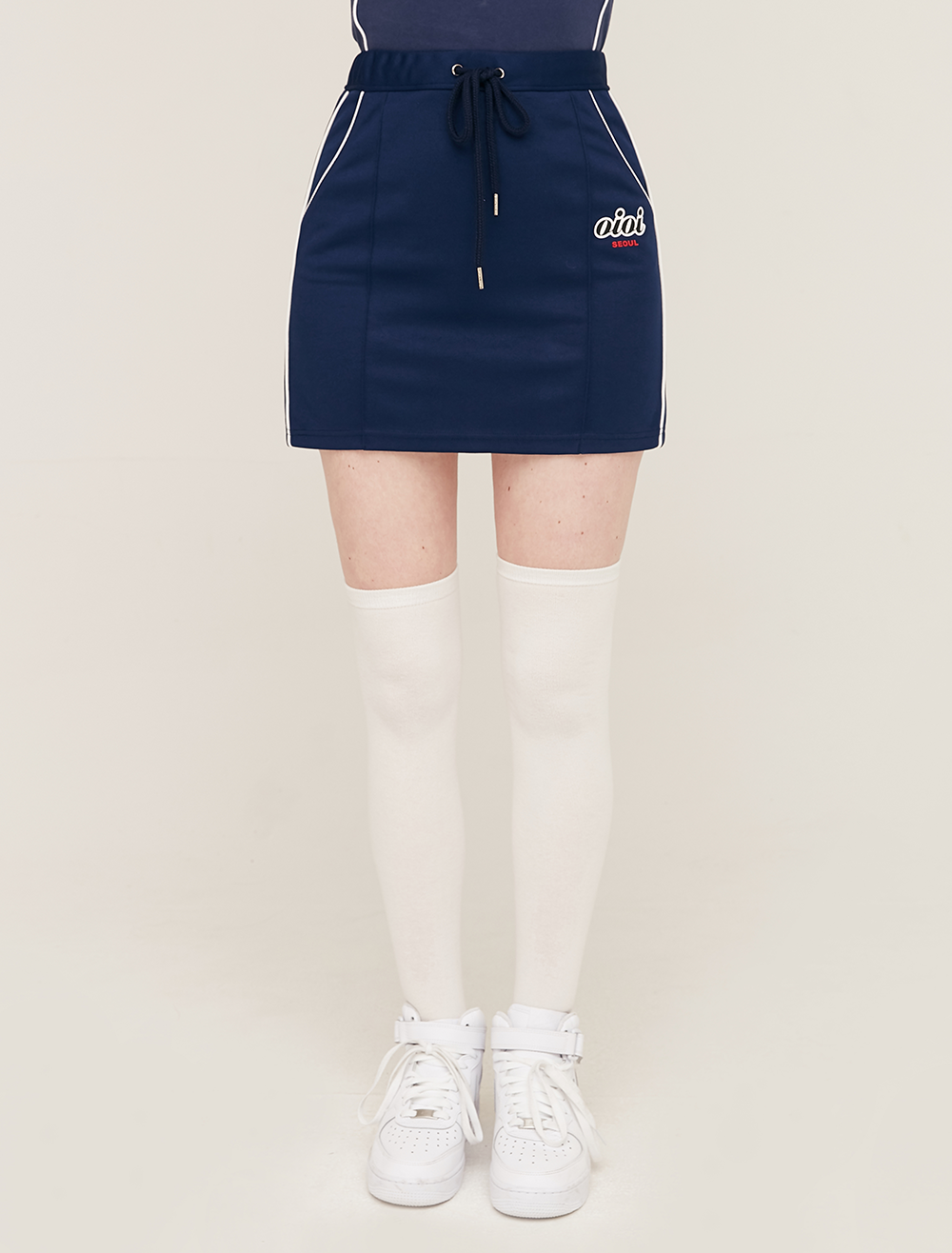 PIPING POINT TRACK SKIRT_navy