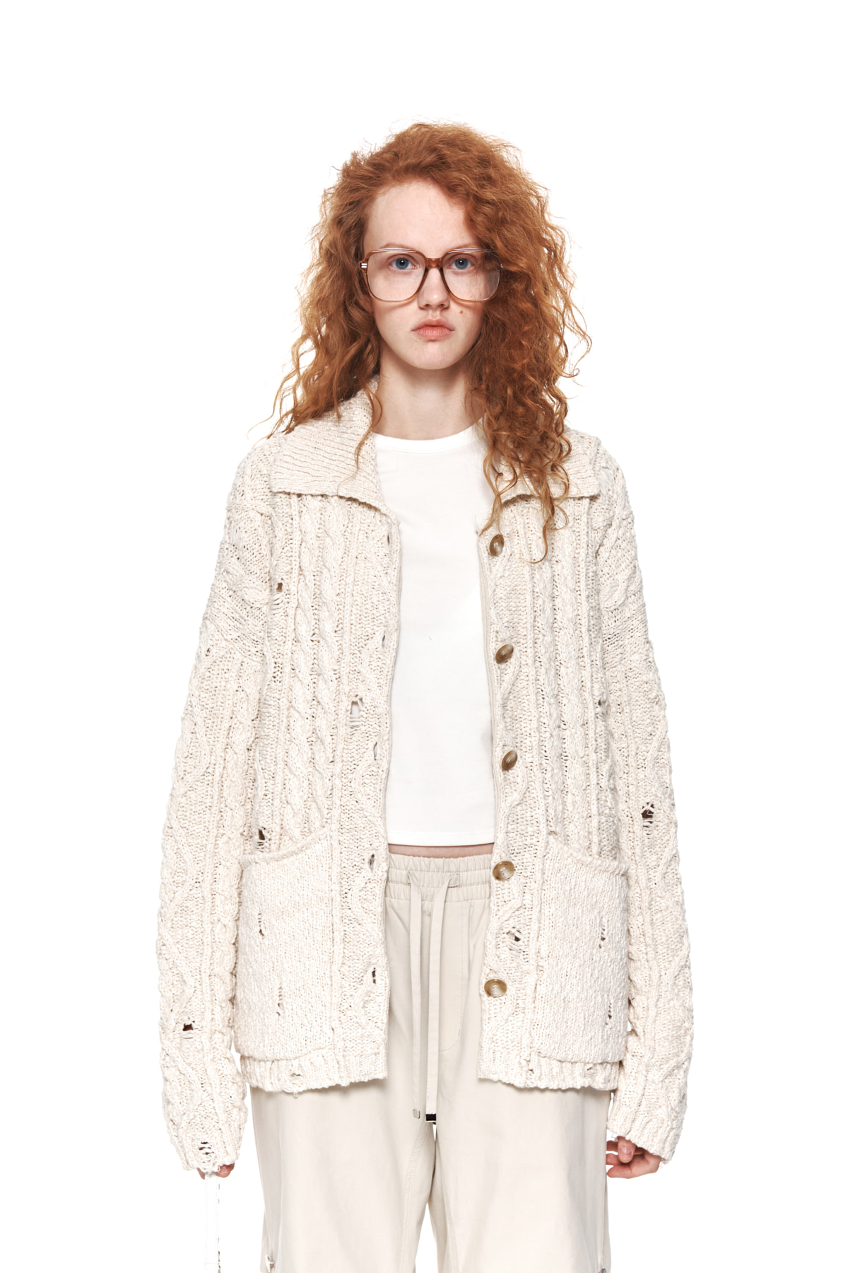 DAMAGE CABLE CARDIGAN IN IVORY