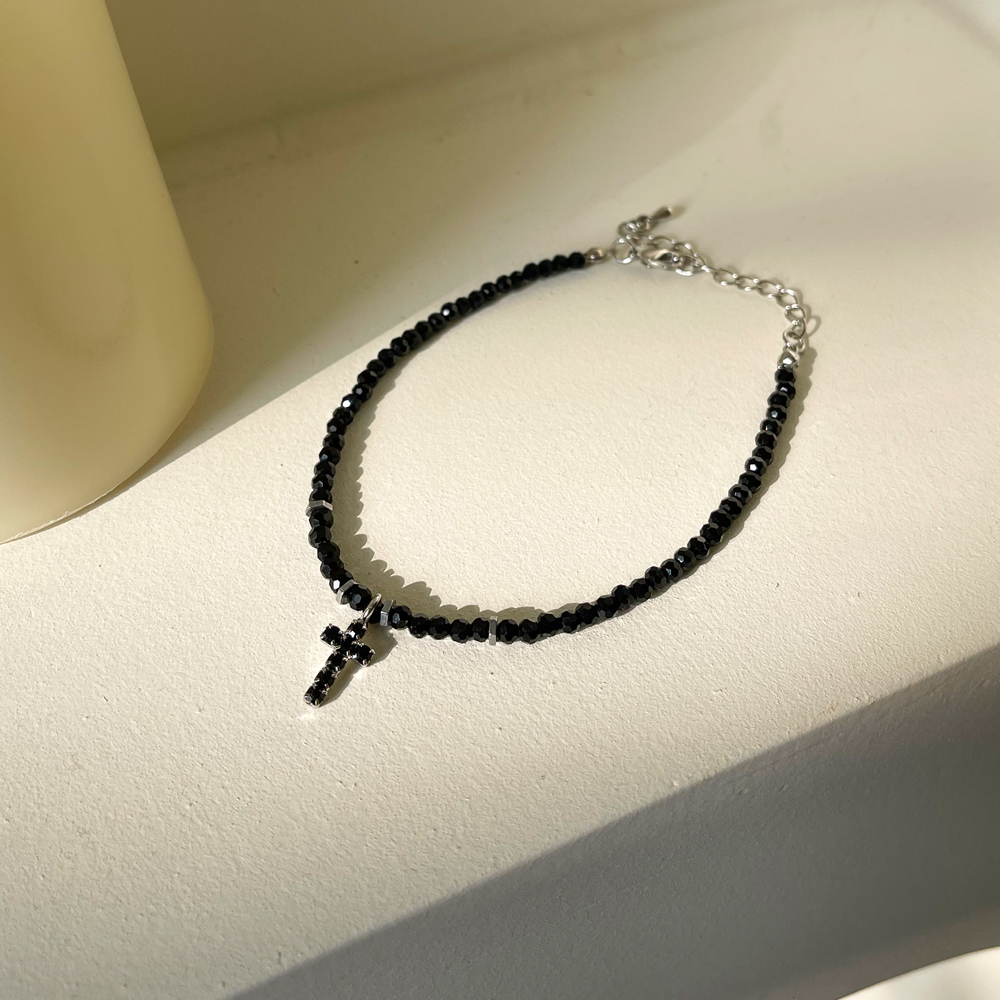 cross black bead bracelet