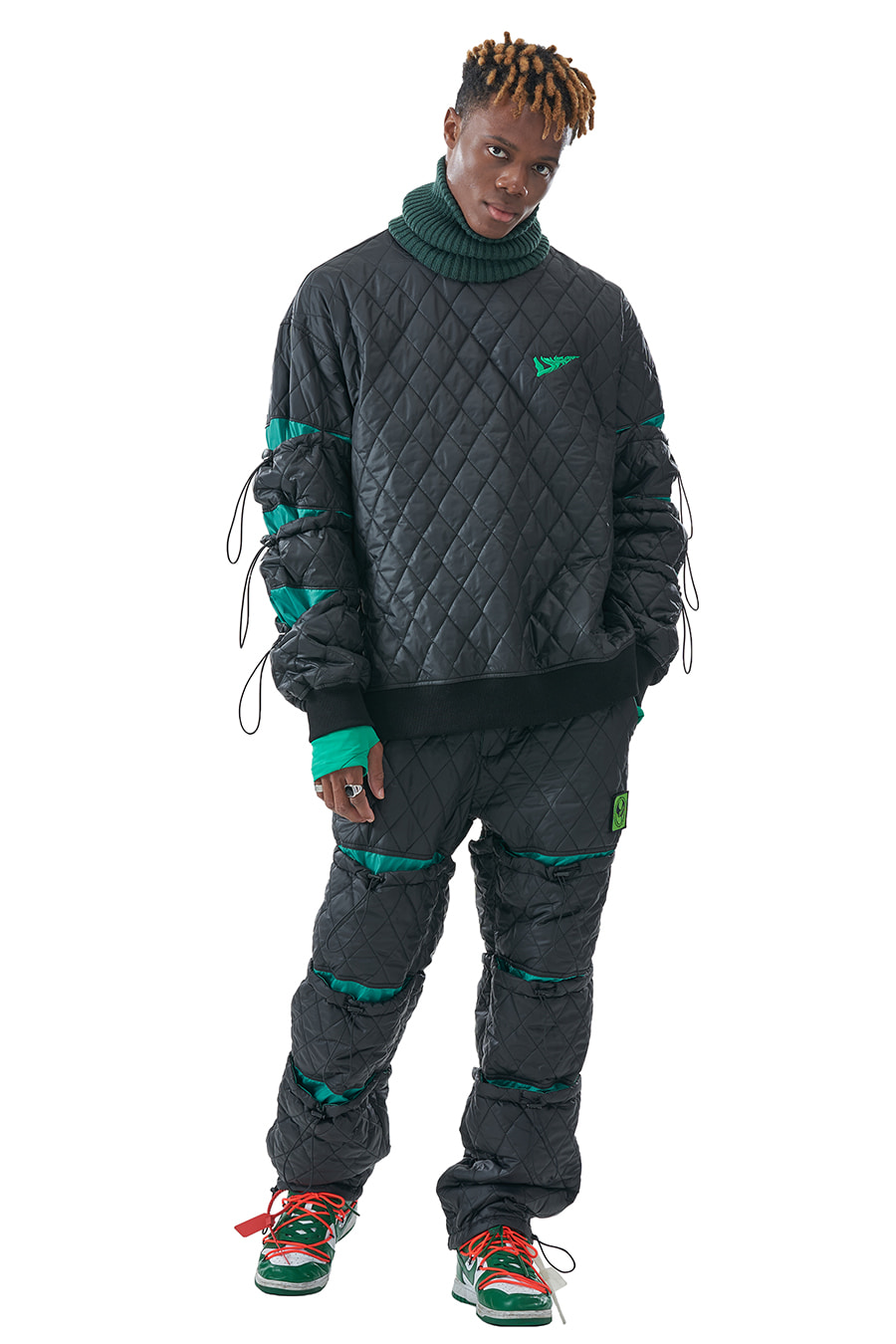 MULTI STRING QUILTED PULLOVER BK