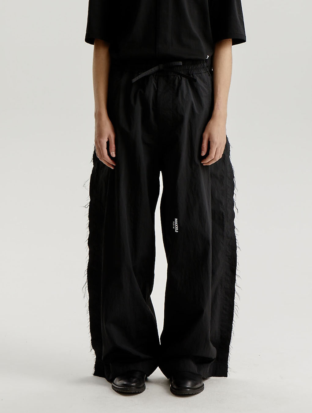 Black Nylon Distressed Wide Trousers