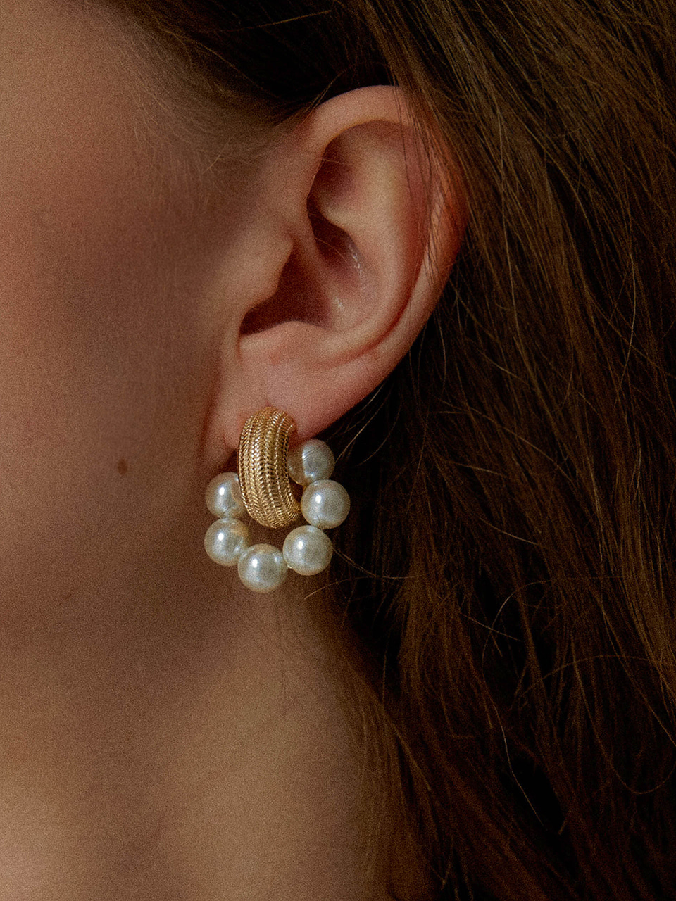 sun pearl earring
