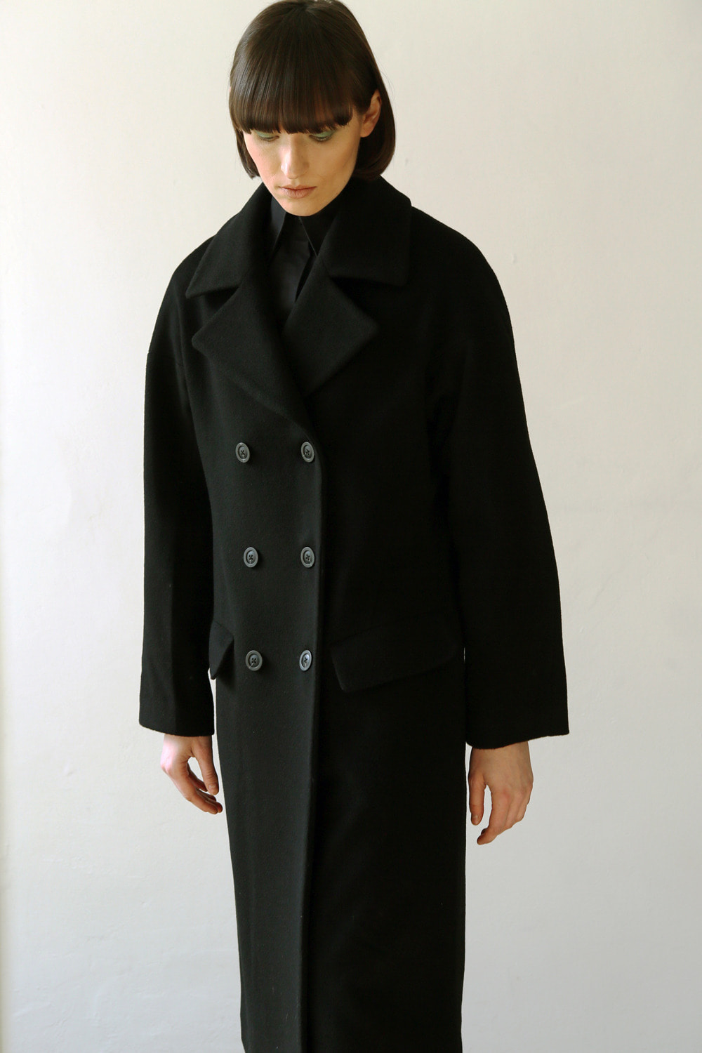 Double breasted long coat in black
