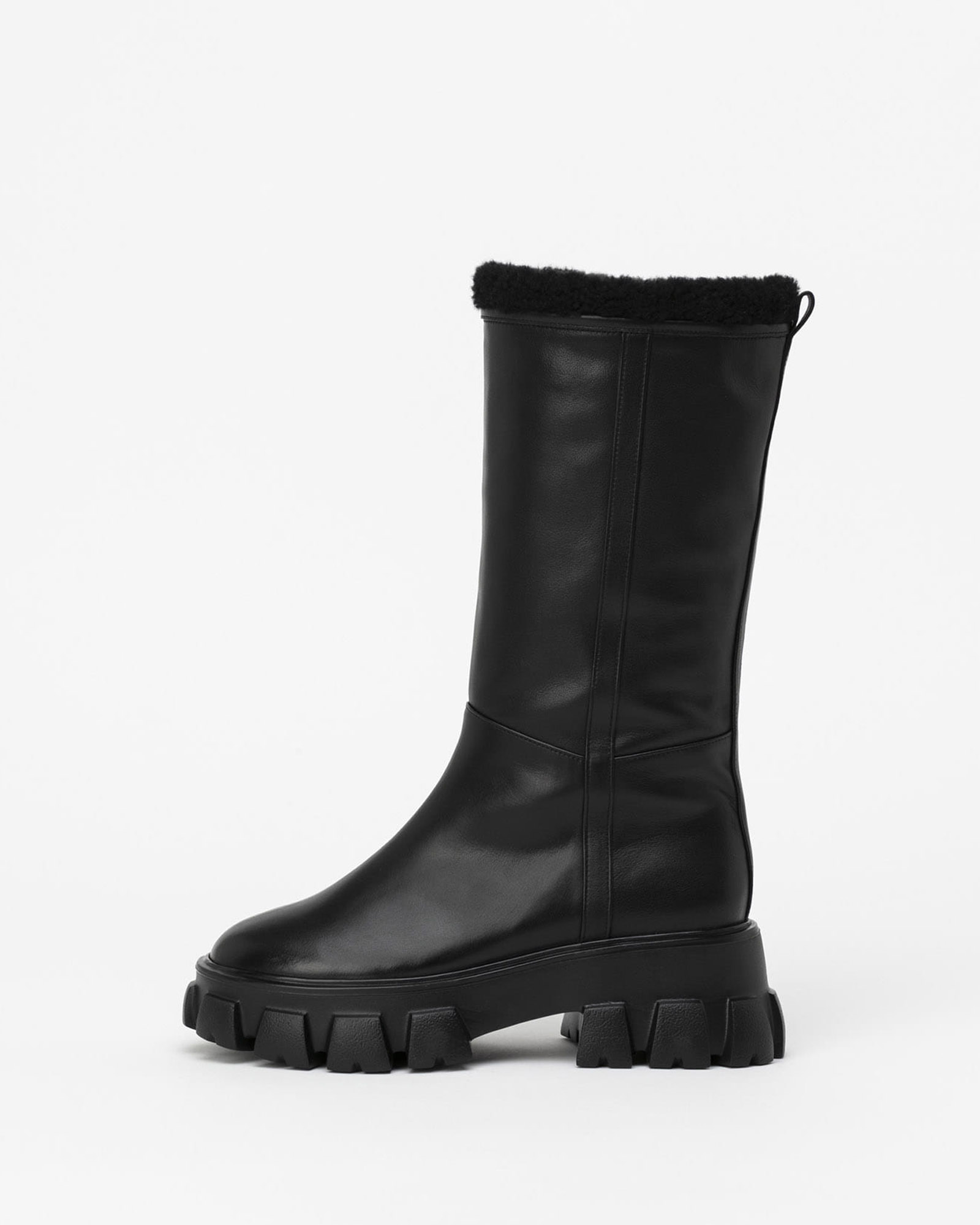 Trione Shealing Lug Sole Boots in Black