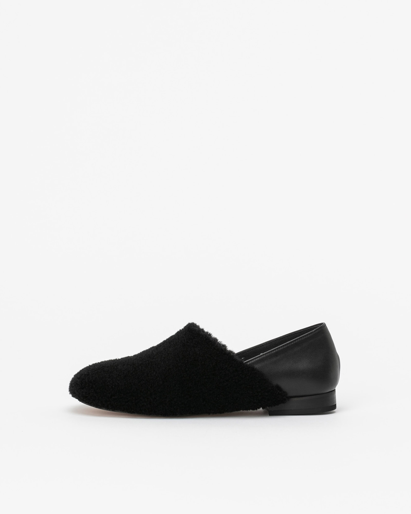 Mina Shearling Fur Flat Shoes in Black