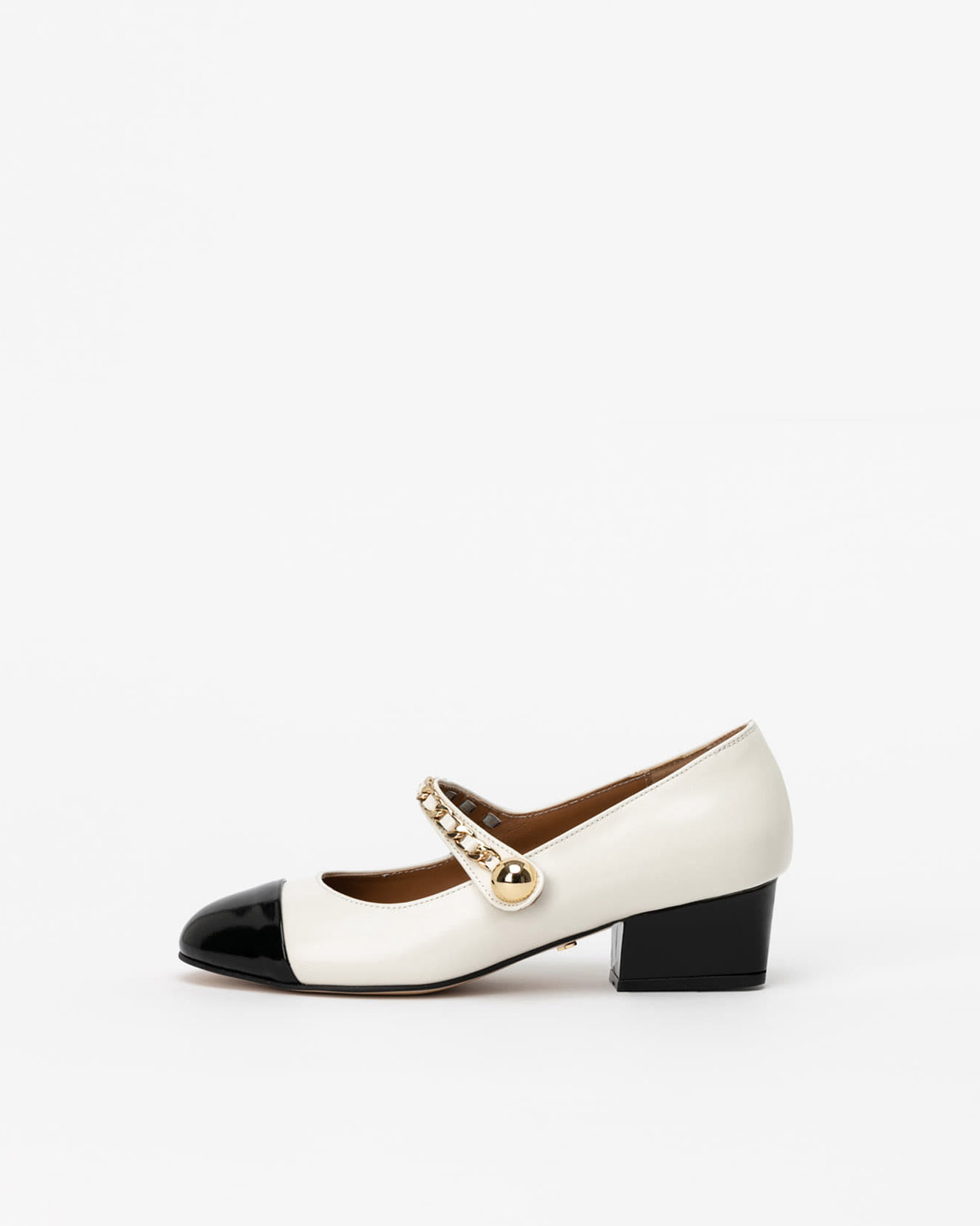 Aria Chained Maryjane Pumps Low in Textured Ivory with Textured Black