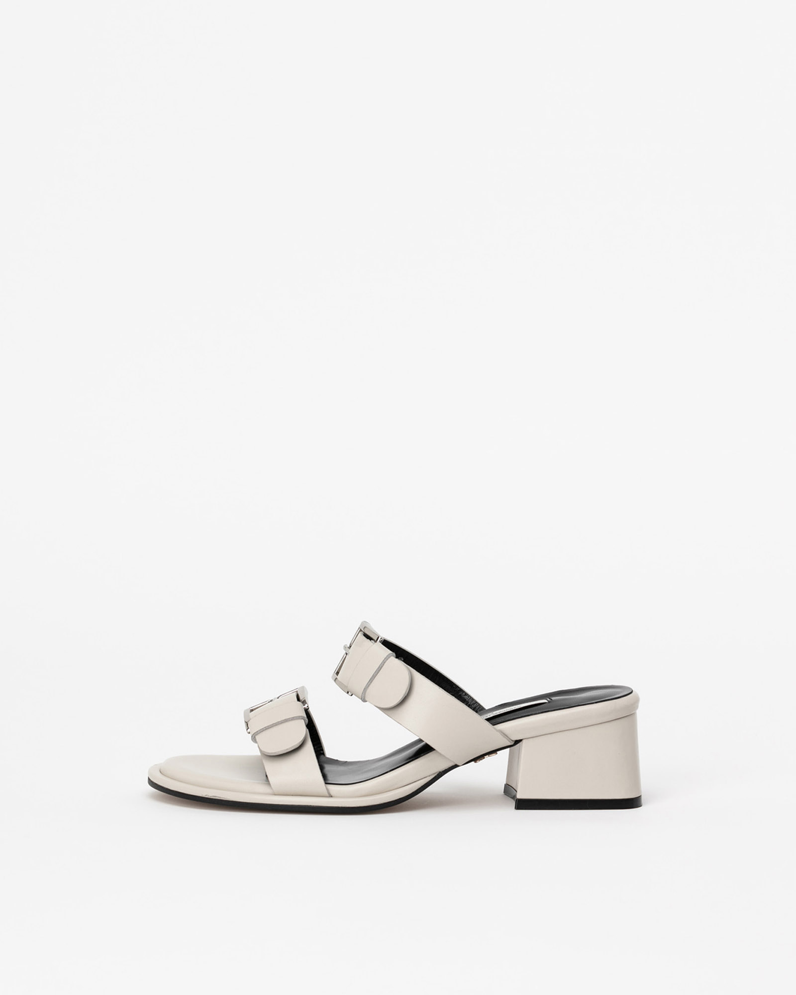 Duebuck Buckled Mule Sandals in Ivory