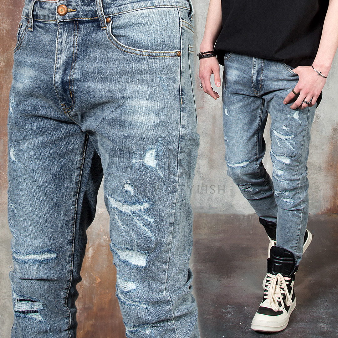 Distressed scratch washed slim jeans