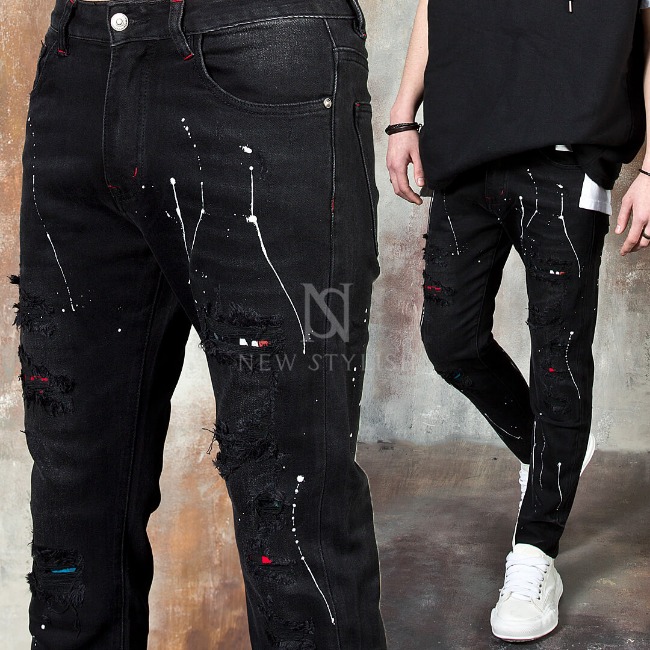 Distressed painted washed black slim jeans