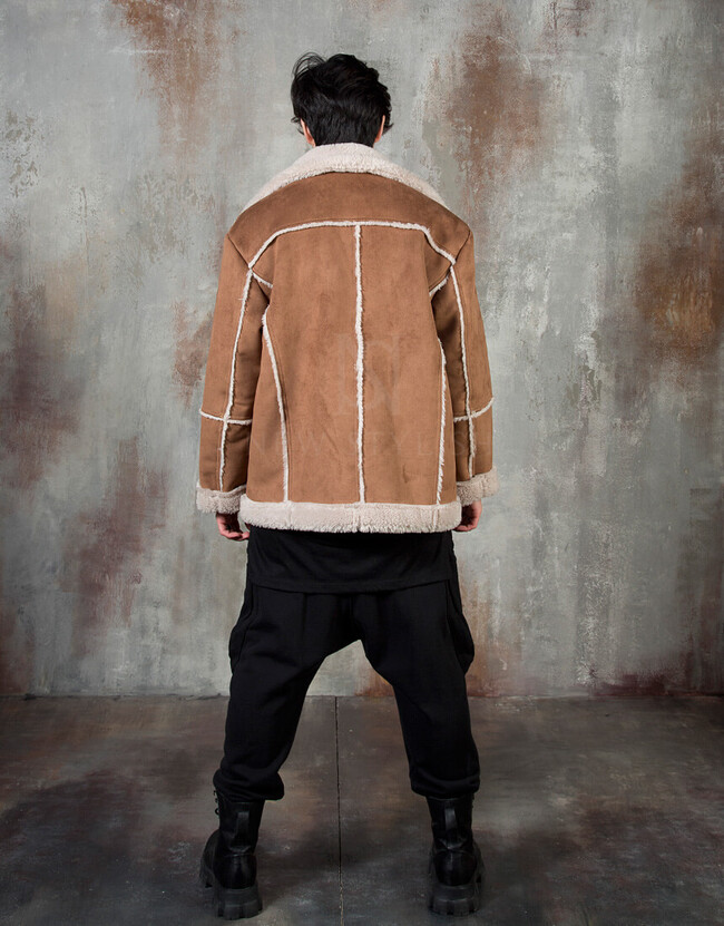 Fur-lined exposed seam leather jacket