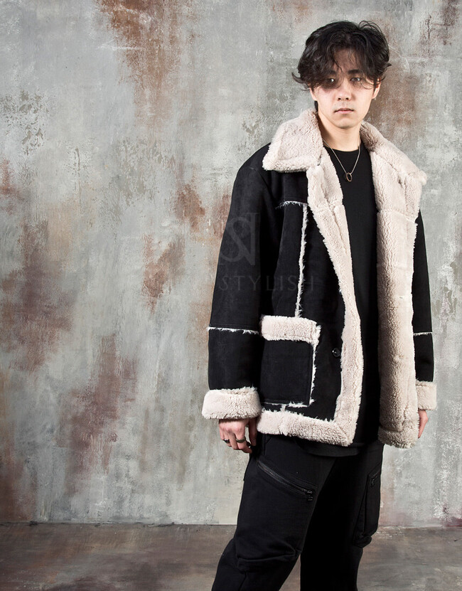 Fur-lined exposed seam leather jacket