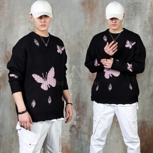 Pink butterfly thread distressed knit sweater