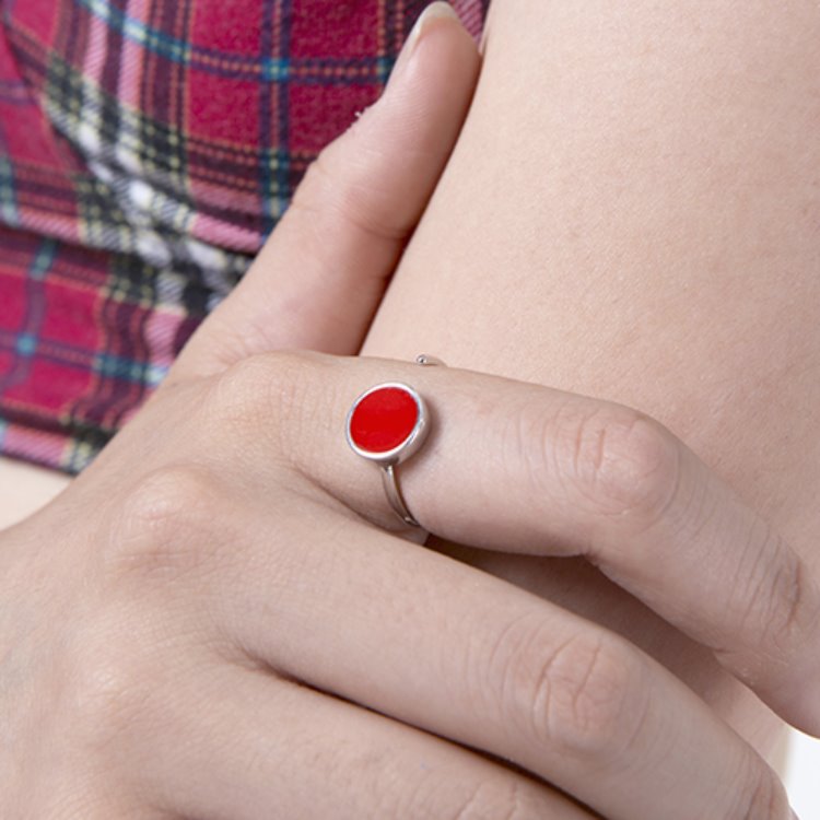 Red symbol ring