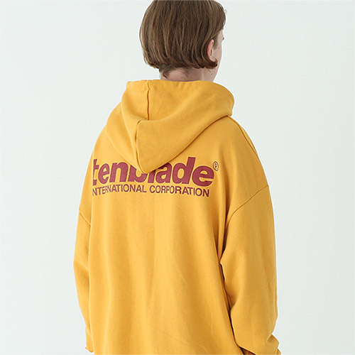 international print hoodie mustard