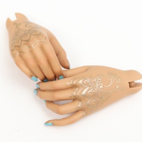 Female Gold Hand Tattoo Blushing